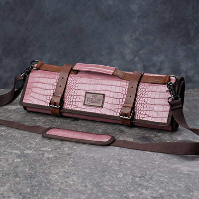 ITAMAE Mochi Knife Bag – dusty pink chef roll with brown leather straps and shoulder sling.